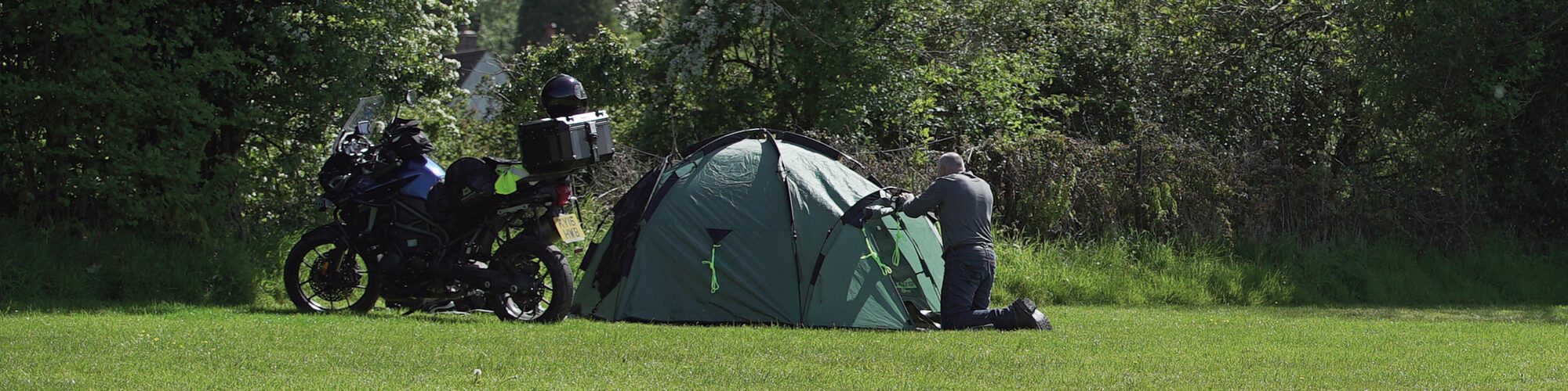 Mature taking a campsite shower